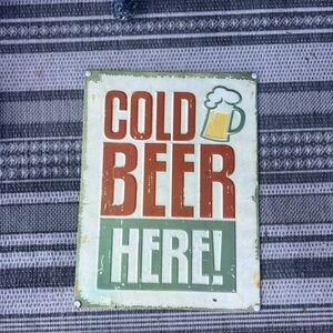 Cold beer sold here outdoor sign